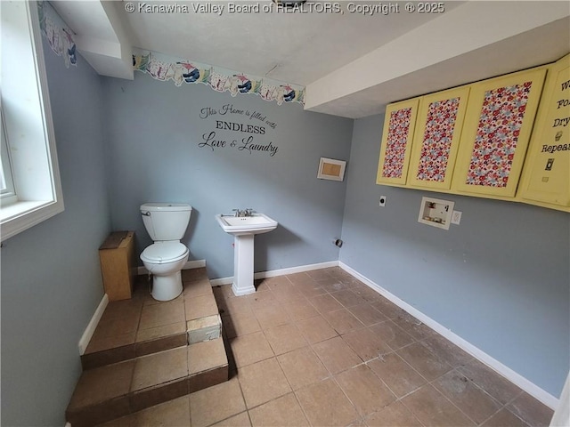 814 Madison Ave, Spencer, WV 25276 - half bath featuring toilet and tile patterned flooring