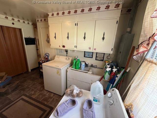 1022 Riverside Dr, Welch, WV 24801 - laundry area with washer / dryer and cabinet space