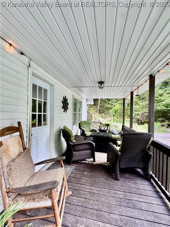 28 Brushy Frk, Alkol, WV 25501 - wooden deck with outdoor lounge area