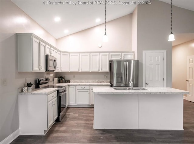 6 Squires Dr, Saint Albans, WV 25177 - kitchen featuring high vaulted ceiling, appliances with stainless steel finishes, light countertops, dark wood-type flooring, and recessed lighting