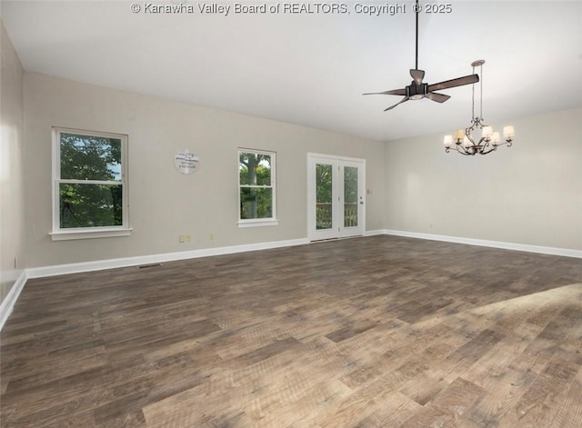 6 Squires Dr, Saint Albans, WV 25177 - empty room featuring healthy amount of natural light, a chandelier, dark wood finished floors, and ceiling fan