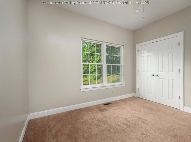 6 Squires Dr, Saint Albans, WV 25177 - unfurnished bedroom featuring carpet floors and multiple windows