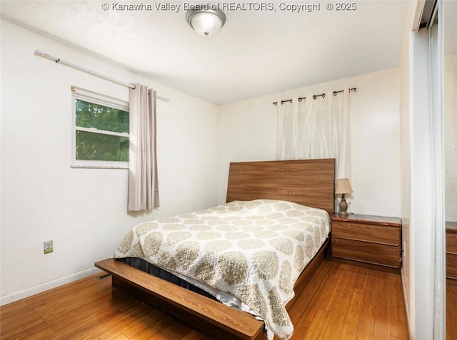 105 Lincoln Hts, Alum Creek, WV 25003 - bedroom with wood finished floors and baseboards