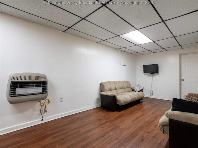 105 Lincoln Hts, Alum Creek, WV 25003 - living area with heating unit, wood finished floors, and a paneled ceiling