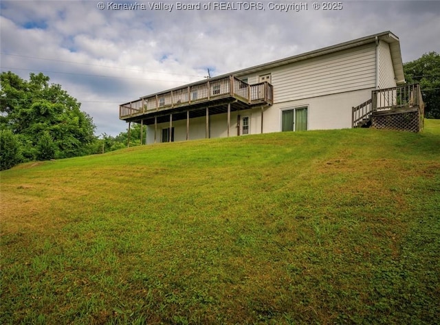 105 Lincoln Hts, Alum Creek, WV 25003 - rear view of house with a wooden deck and a yard