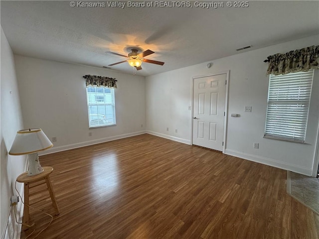 2314 Harrison Ave, Saint Albans, WV 25177 - spare room with a ceiling fan, wood finished floors, and a textured ceiling