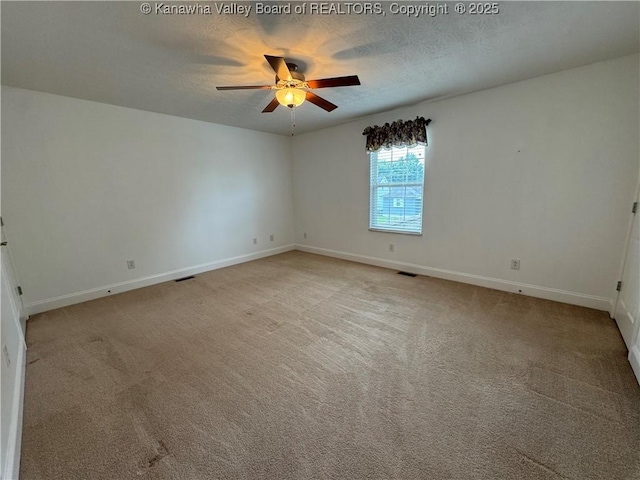 2314 Harrison Ave, Saint Albans, WV 25177 - spare room with ceiling fan, a textured ceiling, and light colored carpet