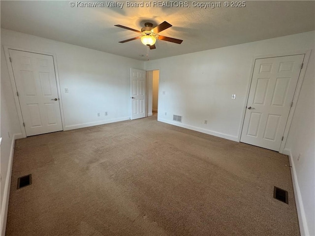 2314 Harrison Ave, Saint Albans, WV 25177 - unfurnished bedroom featuring carpet flooring and a ceiling fan