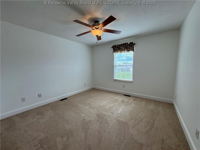 2314 Harrison Ave, Saint Albans, WV 25177 - empty room featuring carpet, a ceiling fan, and a textured ceiling