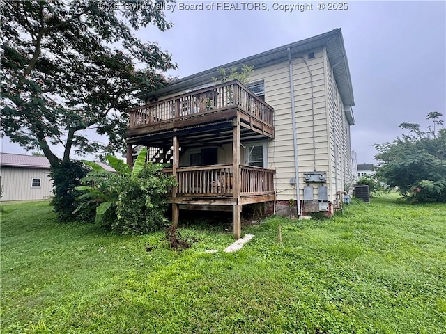 100 22nd St, Dunbar, WV 25064 - rear view of property with a lawn and a wooden deck