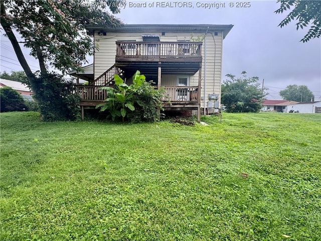 100 22nd St, Dunbar, WV 25064 - back of house with a wooden deck and a lawn