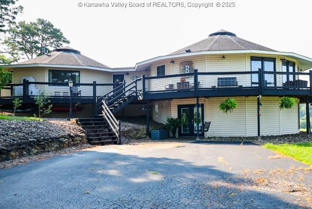 282 Dupont Rd, Poca, WV 25159 - back of house with a wooden deck and stairway