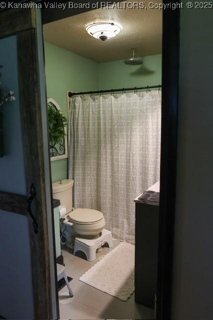 282 Dupont Rd, Poca, WV 25159 - full bath featuring toilet and a shower with curtain