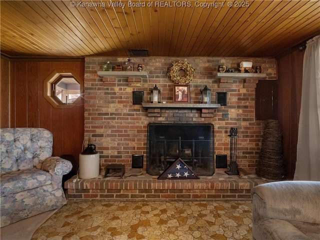 4728 Cain Ridge Rd, Leon, WV 25123 - living room with wood ceiling, wooden walls, and a brick fireplace