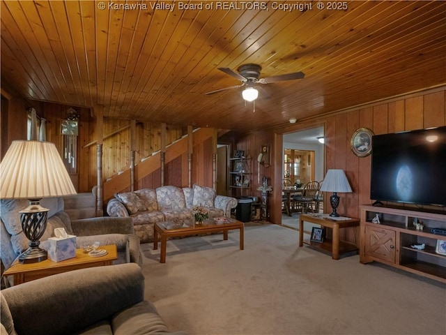 4728 Cain Ridge Rd, Leon, WV 25123 - living area with wood walls, wood ceiling, ceiling fan, and carpet flooring