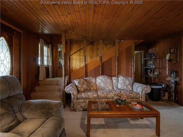 4728 Cain Ridge Rd, Leon, WV 25123 - living room with wooden walls, wooden ceiling, stairs, and carpet flooring