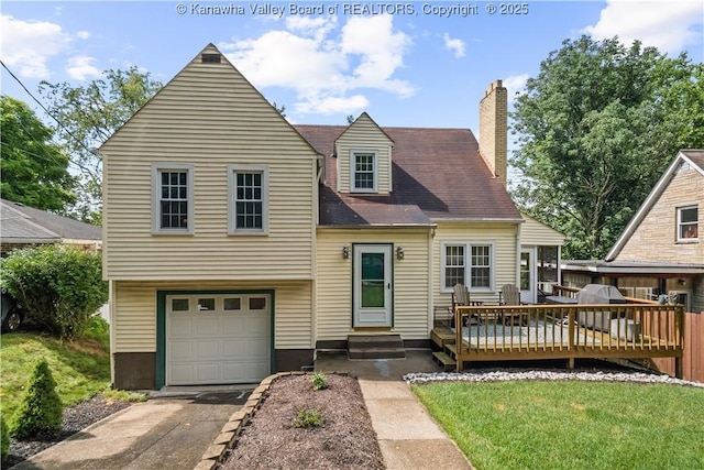 2526 Spring St, South Charleston, WV 25303 - view of front of house featuring an attached garage, concrete driveway, a chimney, a wooden deck, and entry steps