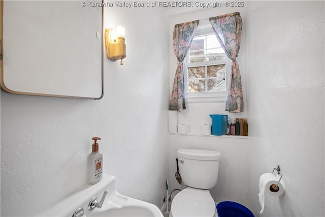 2526 Spring St, South Charleston, WV 25303 - bathroom with toilet and a sink