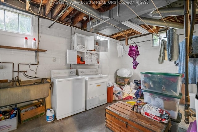 2526 Spring St, South Charleston, WV 25303 - below grade area featuring separate washer and dryer and concrete block wall
