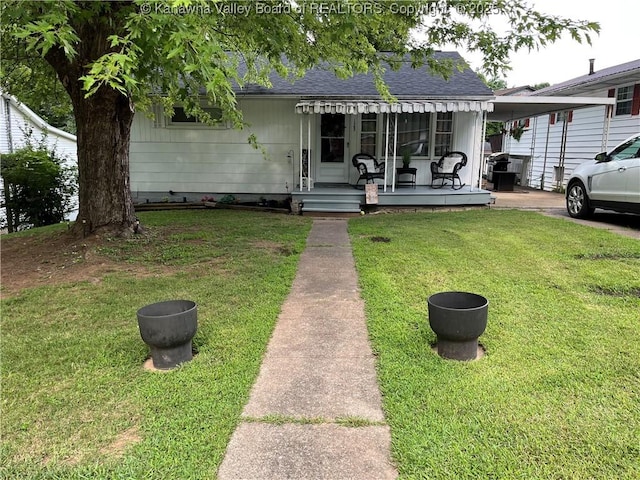 123 Valley Dr, Nitro, WV 25143 - view of front facade with a front lawn and roof with shingles