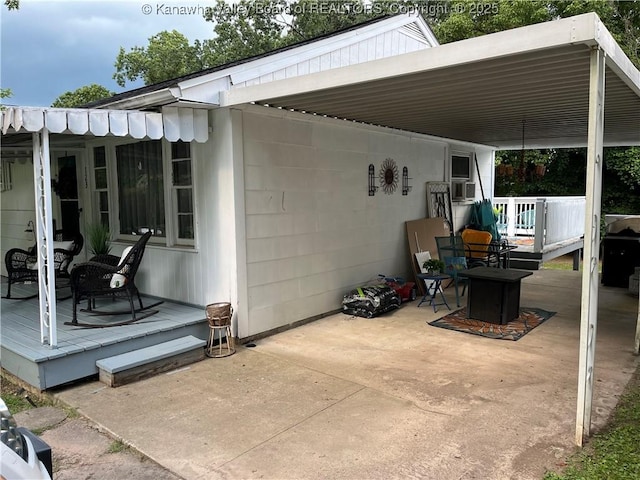 123 Valley Dr, Nitro, WV 25143 - view of patio / terrace featuring a wooden deck and an attached carport