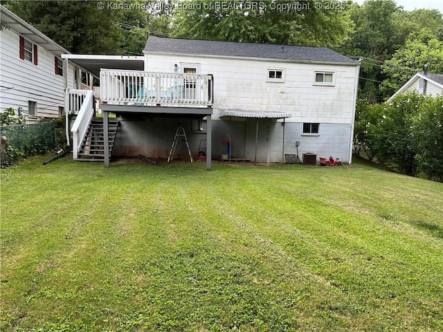 123 Valley Dr, Nitro, WV 25143 - back of property with a wooden deck, a yard, and stairs
