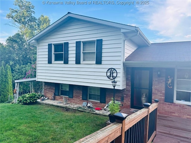 1816 Winding Hill Dr, Sissonville, WV 25320 - split level home with brick siding and a front lawn