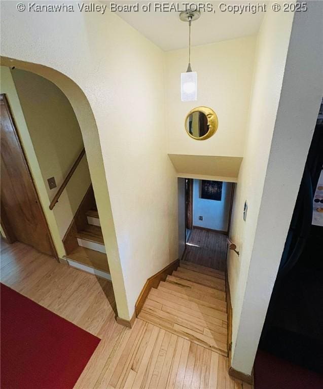 1816 Winding Hill Dr, Sissonville, WV 25320 - stairs with wood finished floors and arched walkways