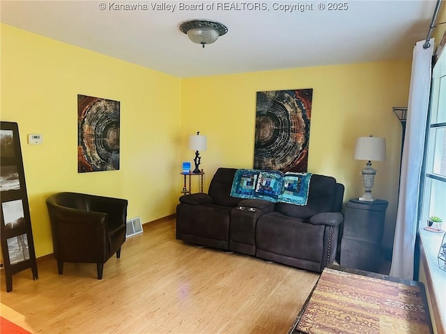 1816 Winding Hill Dr, Sissonville, WV 25320 - living room with wood finished floors and baseboards