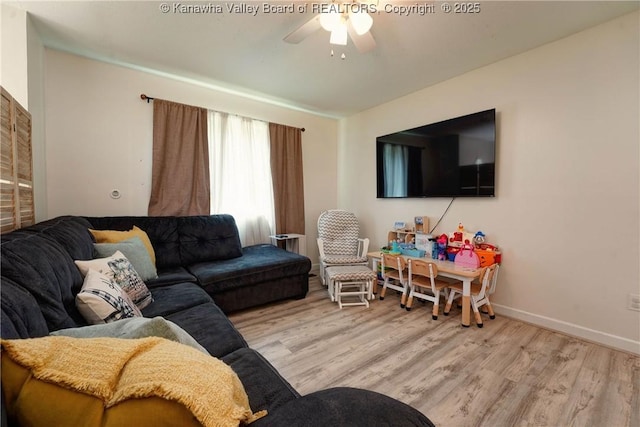 51 Beaver Dr, Hurricane, WV 25526 - living room with a ceiling fan and wood finished floors