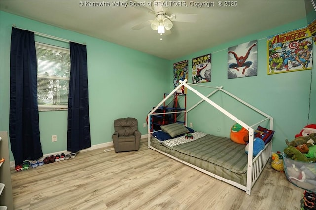 51 Beaver Dr, Hurricane, WV 25526 - bedroom with wood finished floors and a ceiling fan
