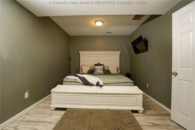 51 Beaver Dr, Hurricane, WV 25526 - bedroom featuring light wood finished floors and baseboards