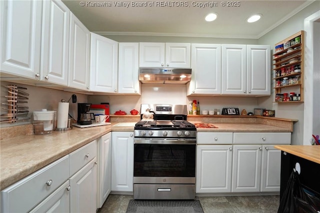 1009 Midway Dr, Dunbar, WV 25064 - kitchen featuring stainless steel gas range oven, under cabinet range hood, light countertops, white cabinets, and ornamental molding
