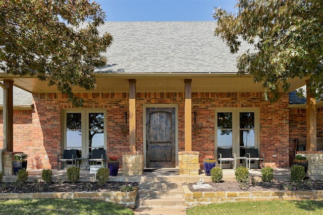 property entrance featuring covered porch