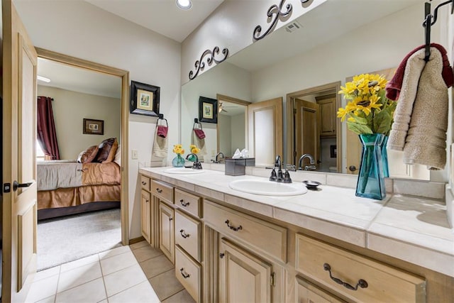 bathroom with vanity and tile patterned floors