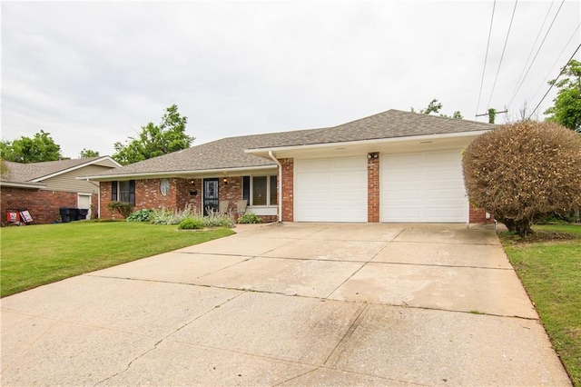 ranch-style home with a front yard and a garage