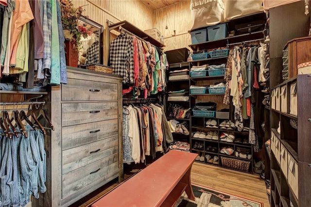 spacious closet featuring hardwood / wood-style flooring