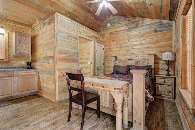 bedroom with wood walls, wood ceiling, lofted ceiling, and light hardwood / wood-style floors