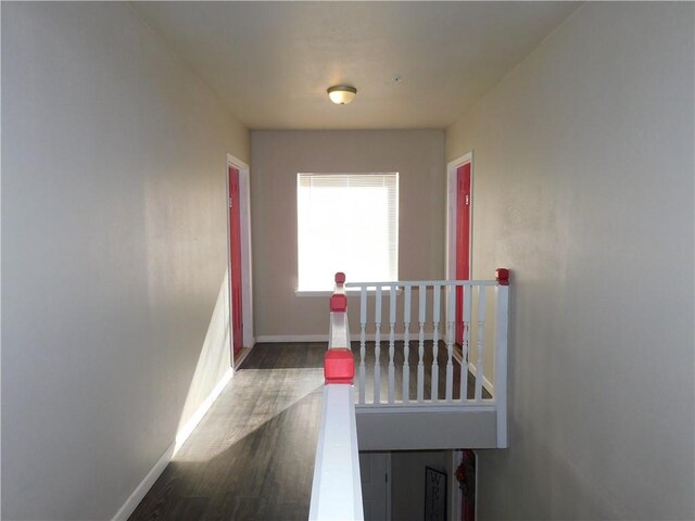 hallway featuring dark hardwood / wood-style floors