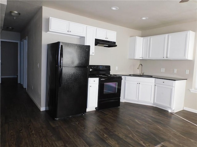 kitchen featuring black appliances, dark hardwood / wood-style floors, white cabinetry, and sink