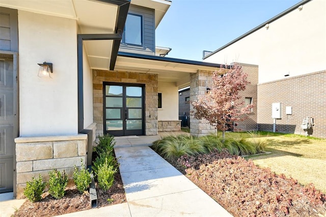 doorway to property featuring french doors