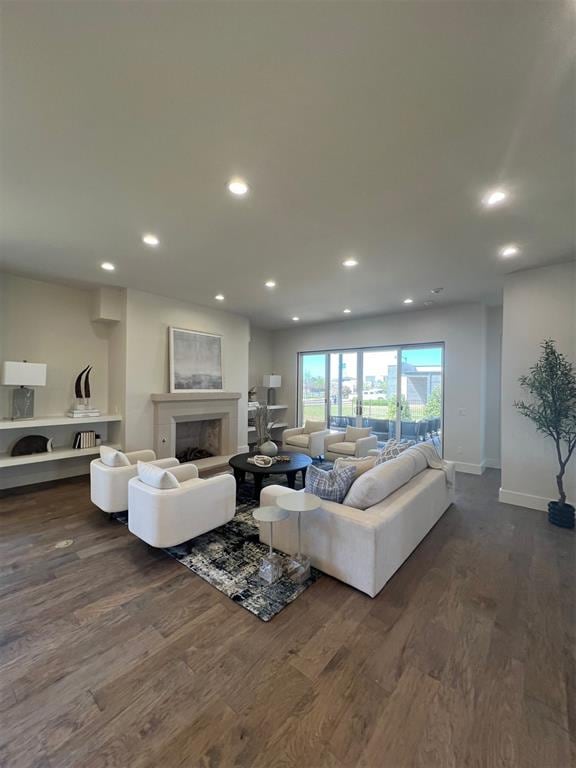 living room with dark hardwood / wood-style floors