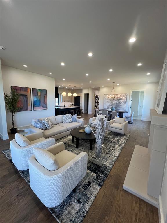 living room featuring dark hardwood / wood-style flooring