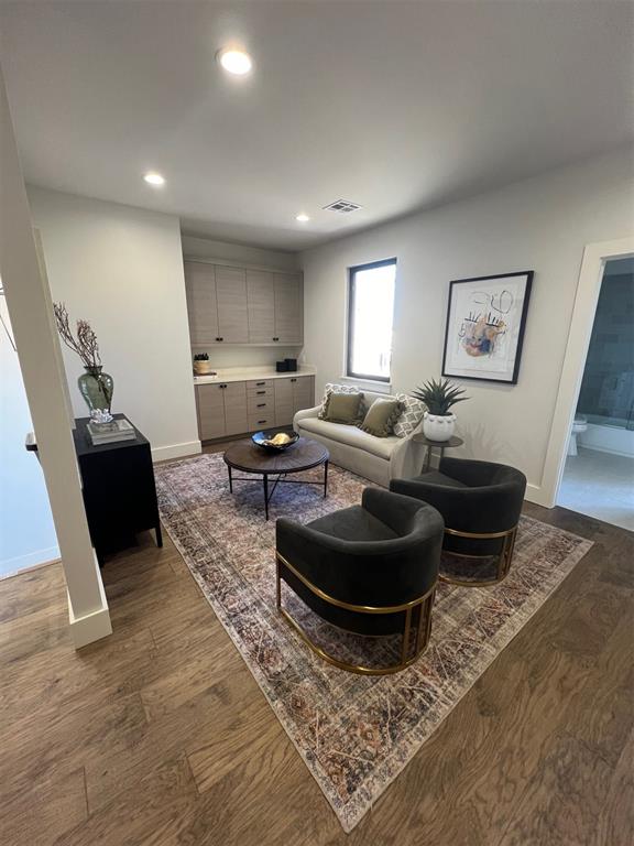 living room featuring dark wood-type flooring