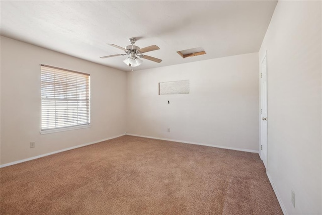 carpeted empty room with ceiling fan