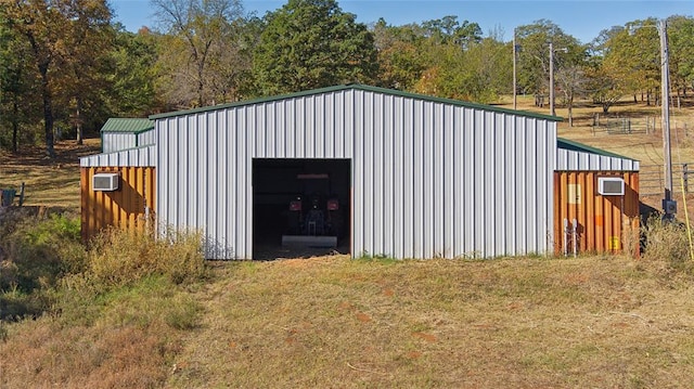 view of outbuilding featuring a garage