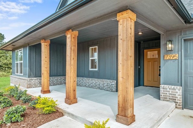 entrance to property with covered porch