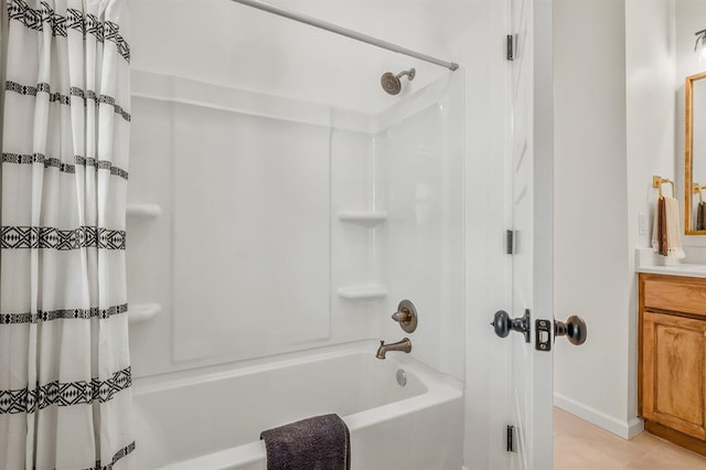 bathroom featuring shower / bath combo, vanity, and tile patterned floors