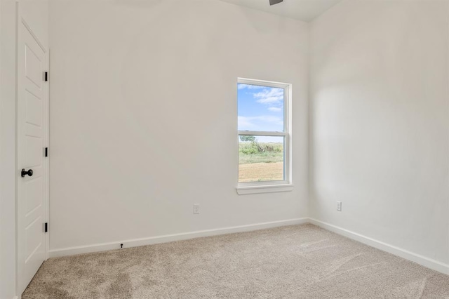 empty room with carpet flooring