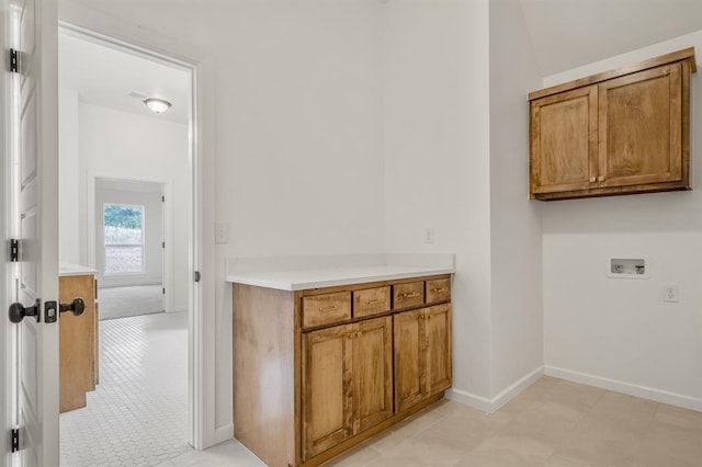 laundry area featuring cabinets and washer hookup